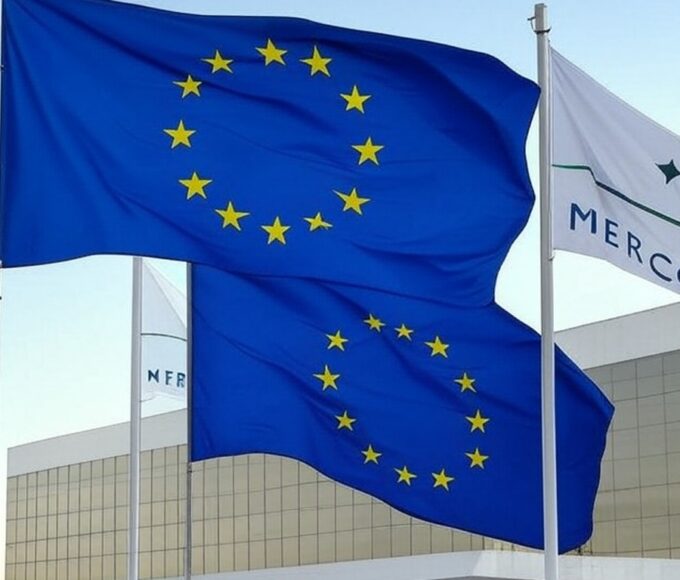 Bandeiras da UE e Mercosul em Brasília representando acordo histórico de livre-comércio.