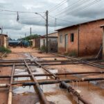Reservatório de água vazio em Sucupira, DF, destacando abastecimento irregular e ação paliativa do GDF.